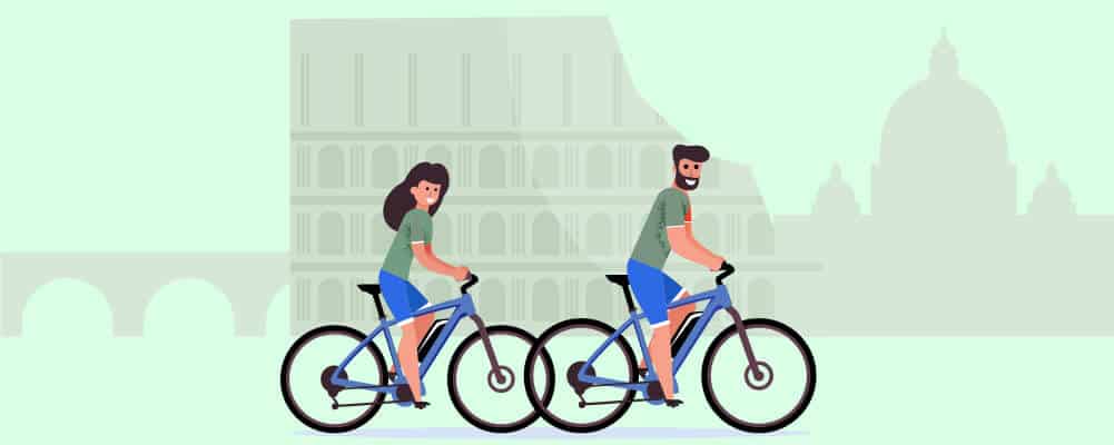 Man and woman riding a bicycle