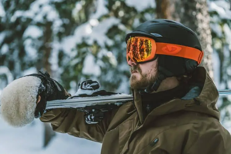 Man with layers for snowboarding